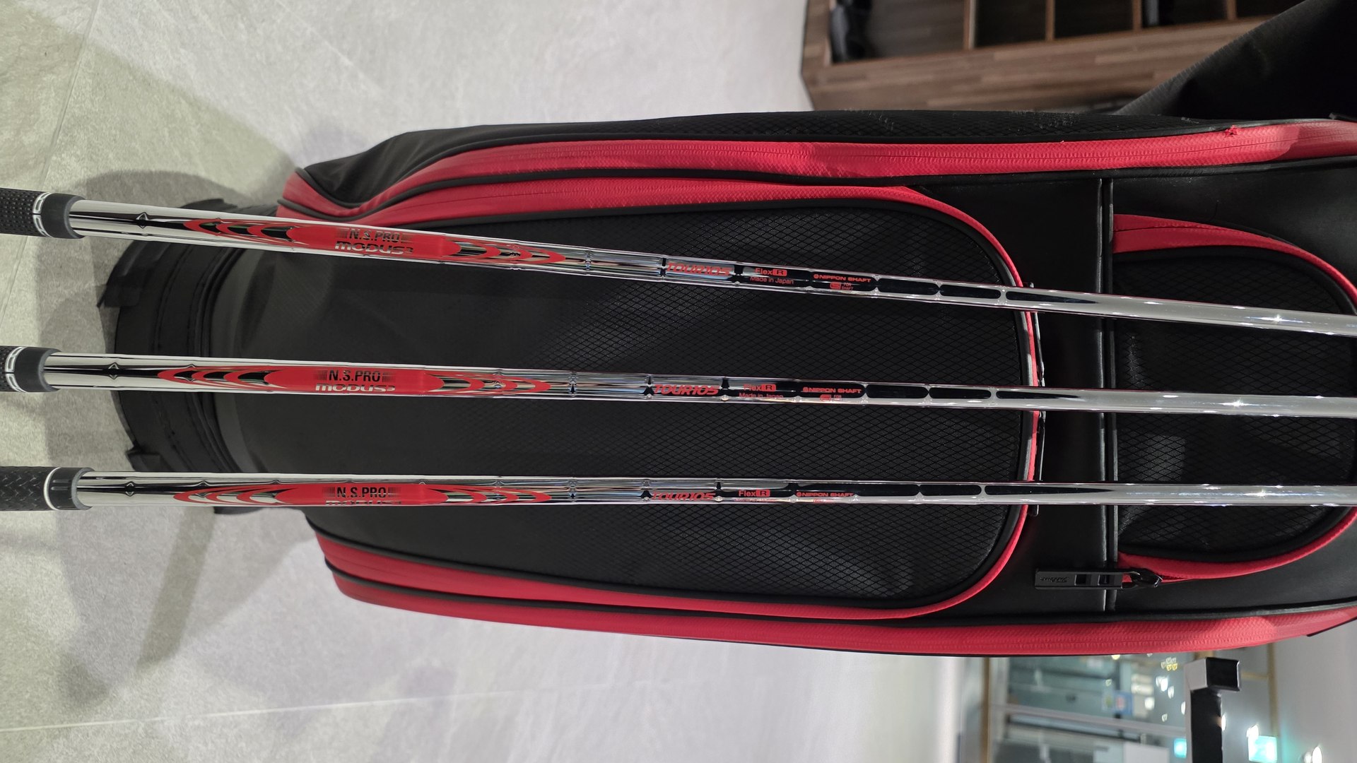 Close-up of the author's N.S. Pro Modus3 Tour 105 shaft band showing the Flex R marking.